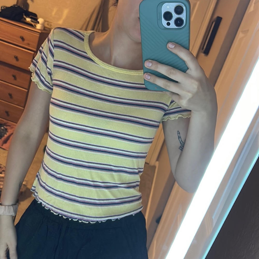 Women’s yellow striped shirt with frills